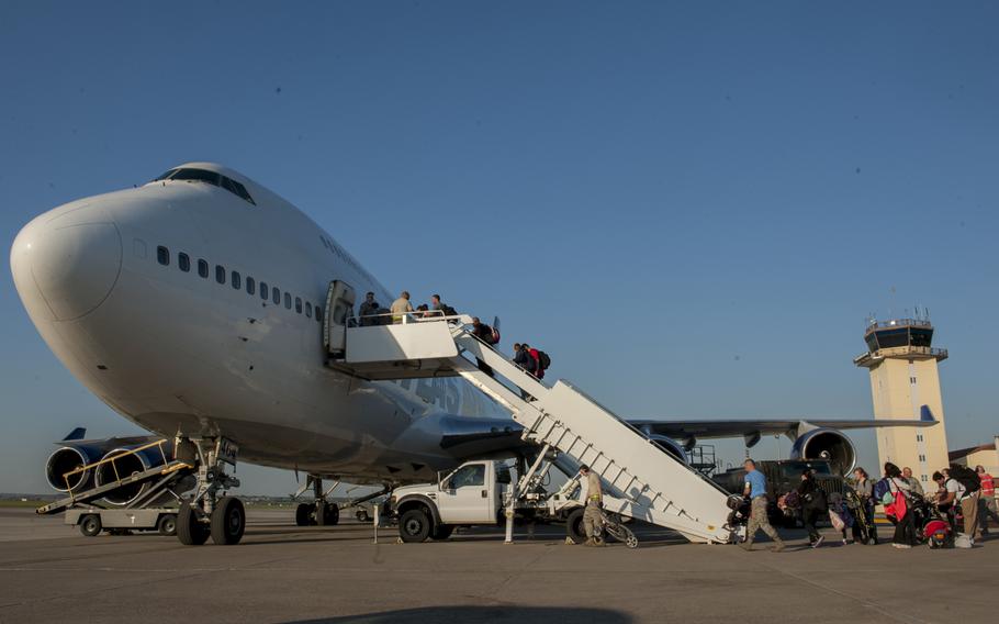 Families of U.S. airmen and families of Department of Defense civilians board an Atlas Air 747 airliner April 1, 2016, at Incirlik Air Base, Turkey. All Department of Defense dependents were assigned to leave because of security concerns. About 40 teachers at Defense Department-run schools are expected to begin moving in about three weeks.