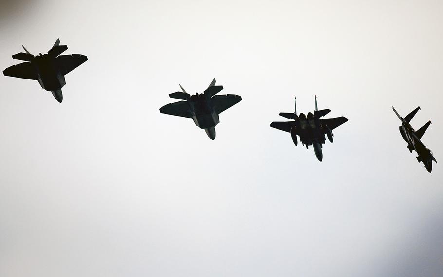 F-22 Raptors conduct air-to-air training with F-15E Strike Eagles on April 11, 2016, at RAF Lakenheath, England. The F-22s are deployed to Europe from Florida as part of Atlantic Resolve. Matthew Plew/U.S. Air Force