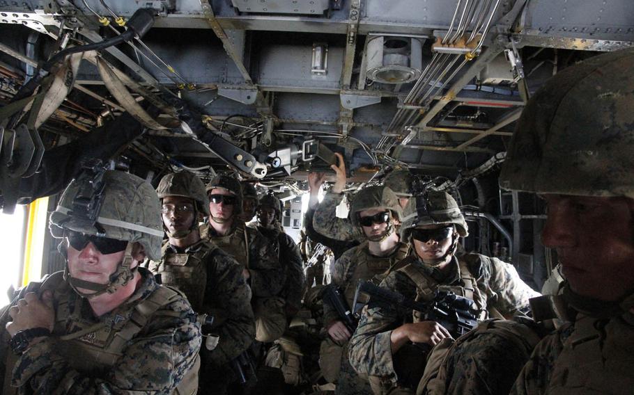 Marines from Golf Company, 2nd Battalion, 2nd Marines, fly in an MV-22 Osprey during Exercise Balikatan in the Philippines, Monday, April 11, 2016. The nations have found a greater common cause in the past several years as China ramps up claims and activities in the Spratly Islands near Palawan.