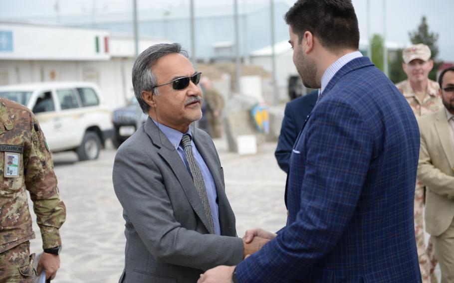Daoud Sultanzoy, chairman of the Afghanistan Airfield Economic Development Commission, meets officials at the first official meeting of the development commission's Herat chapter at the Italian-run Camp Arena on April 7, 2016.