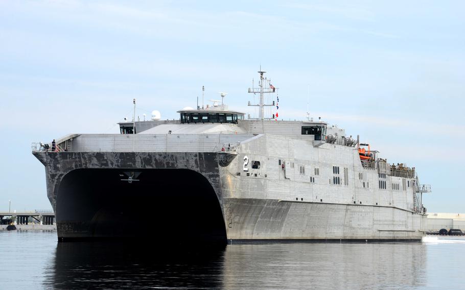 The Military Sealift Command joint high-speed vessel USNS Choctaw County prepares to moor pierside at Naval Station Mayport, Fla., basin after picking up U.S. servicemembers. The Choctaw County currently is taking part in mine countermeasure exercises in the Middle East.