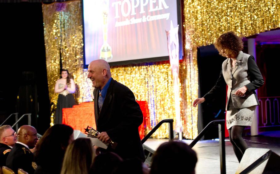 PJ Schuepbach-Ahearn exits the stage after accepting his award for best supporting actor in a musical during the Toppers award show in Kaiserslautern, Germany, on Saturday, April 23, 2016. Schuepbach-Ahearn won for his portrayal of Leaf Coneybear in Ansbach?s production of "The 25th Annual Putnam County Spelling Bee".