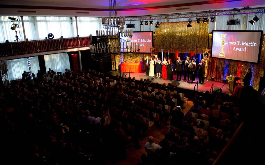 The Toppers Singers perform the song "In Whatever Time We Have" during the annual U.S. Army Tournament of Plays awards show in Kaiserslautern, Germany, on Saturday, April 23, 2016.
