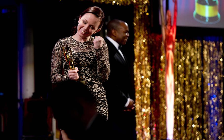 Airman 1st Class Jessica Lynne Hoyle celebrates after winning best military actress in a play during the annual Tournament of Plays awards in Kaiserslautern, Germany, on Saturday, April 23, 2016. Hoyle played Maggie in the Baumholder's Hilltop Theater production "Lend Me a Tenor". 