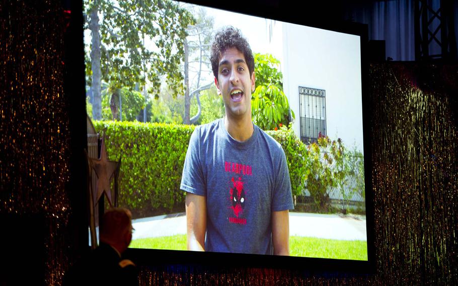 Actor Karan Soni announces an award winner via a recorded video message during the annual Tournament of Plays in Kaiserslautern, Germany, on Saturday, April 23, 2016.
                Michael B. Keller/Stars and Stripes