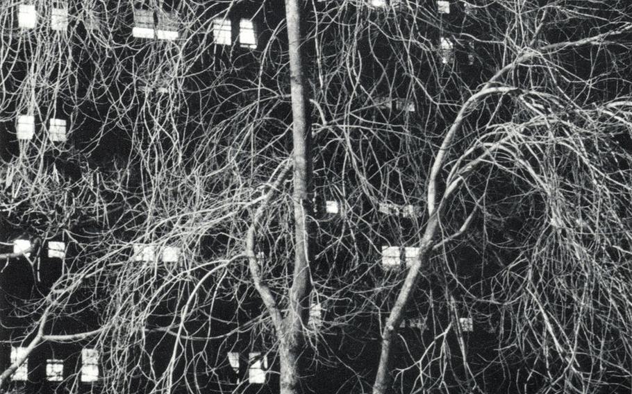 Hungarian-born photographer Andre Kertesz had been in New York City more than 20 years when he took "Washington Square" (1958). Kertesz offers a romantic view of his adopted hometown that verges on the pure abstraction of Wassily Kandinsky.