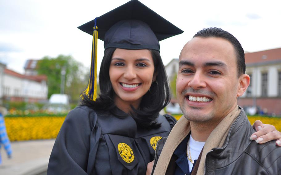 Maria Lozano of Kaiserslautern, Germany, earned a bachelor's degree in finance from University of Maryland University College Europe on Saturday, April 30, in Kaiserslautern. Lozano, who's a native Spanish speaker, overcame the language barrier to become the first person in her family to earn a college degree. She's pictured with her husband, Luis Morales.