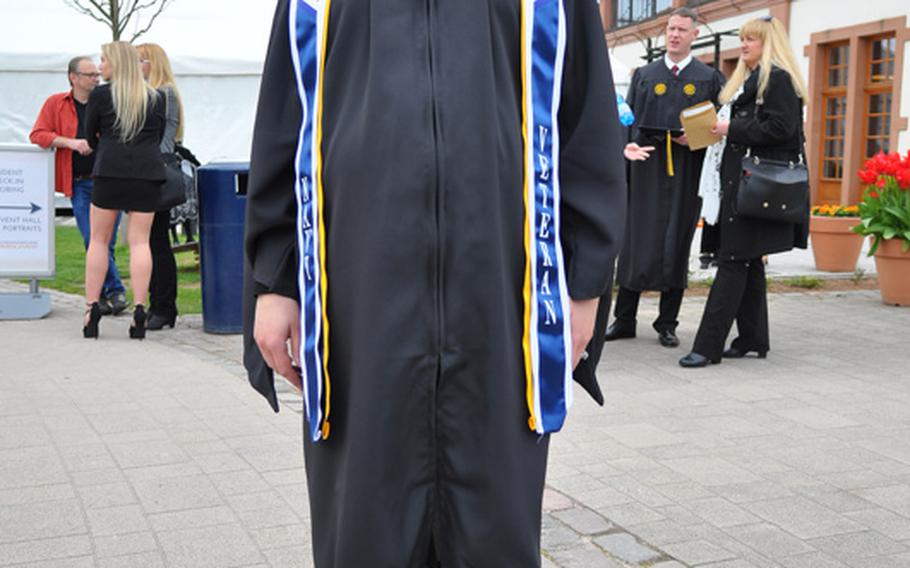 Tammy Husted, 36, of Wiesbaden, Germany, is thrilled to be earning her master's degree in information technology with an emphasis on information assurance before her twins are born. Husted attended the University of Maryland University College Europe commencement ceremonies on Saturday, April 30, 2016, in Kaiserslautern, Germany, while eight-months pregnant with twins.