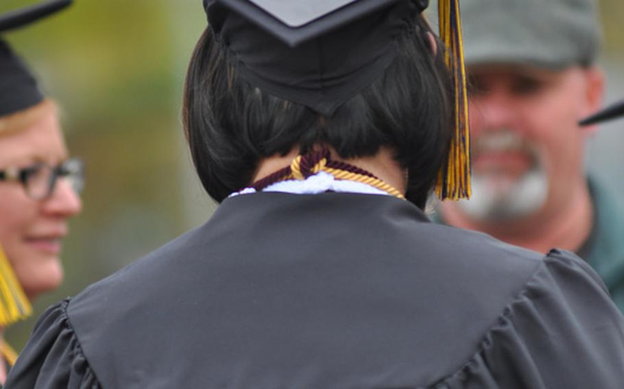 Darth Vader stared back from the graduation cap of Genevieve Chicka, 45, a civilian from Kaiserslautern, Germany, who was one of about 200 graduates participating in University Maryland University College Europe's commencement ceremony on Saturday, April 30, 2016.
