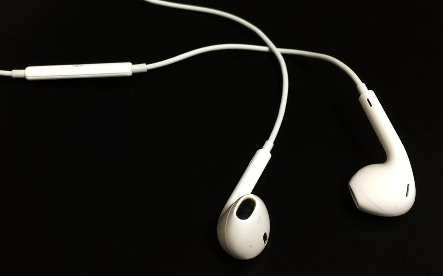 Soldiers are now allowed to wear headphones while working out at fitness centers in their physical-training uniforms, but outdoor headphone use will remain prohibited, according to an Army directive issued Friday, May 6, 2016.