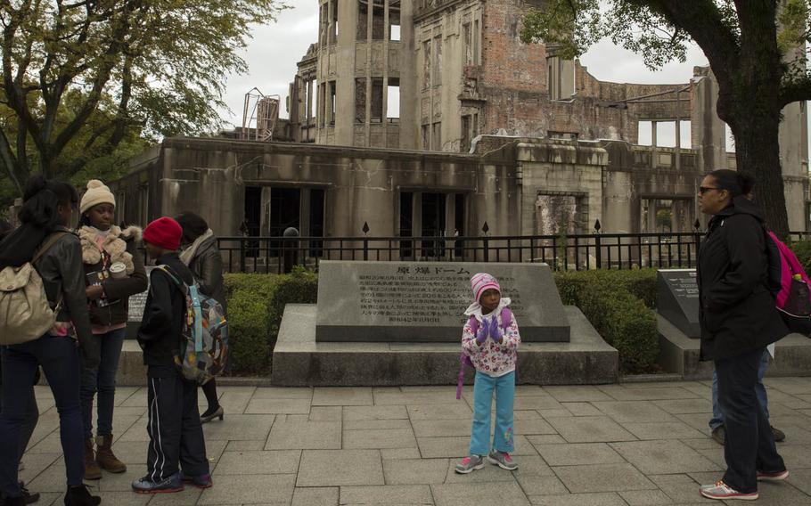 Visitors from Marine Corps Air Station Iwakuni, Japan, tour the Hiroshima Peace Memorial in December. President Barack Obama will travel to Hiroshima this month, making the first visit by a sitting U.S. president to the site where the U.S. first dropped an atomic bomb in 1945.