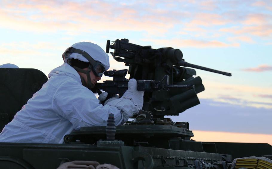 A U.S. Army Alaska soldier with Bravo Company, 3-21 Infantry Regiment, 1st Stryker Brigade scans the tundra outside Deadhorse, Alaska, in November. Arctic Anvil drills will take place in Alaska for the first time this year.