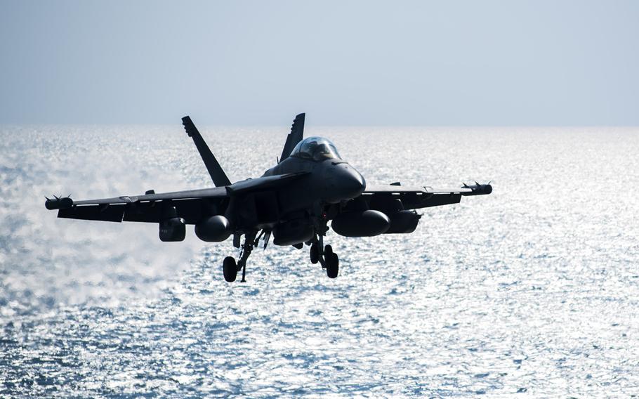 An EA-18G Growler, assigned to Electronic Attack Squadron 140, prepares to land on the flight deck of aircraft carrier USS Harry S. Truman Jan. 14, 2016.