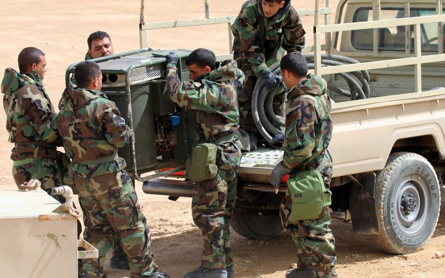 Jordanian armed forces prepare a decontamination site at a chemical, biological, radiological, nuclear and enhanced conventional weapons exercise on a training base near Amman, Jordan, during Eager Lion 16, Wednesday, May 18, 2016.