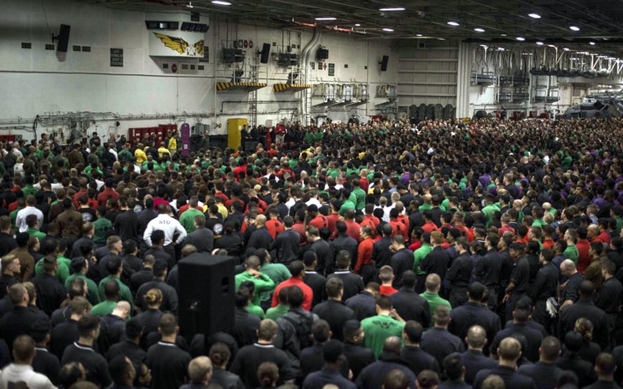 Senior leaders aboard the USS Ronald Reagan discuss alcohol and curfew restrictions with sailors on June 6, 2016, in waters south of Japan. The Navy enacted the restrictions following a series of off-base arrests.
                