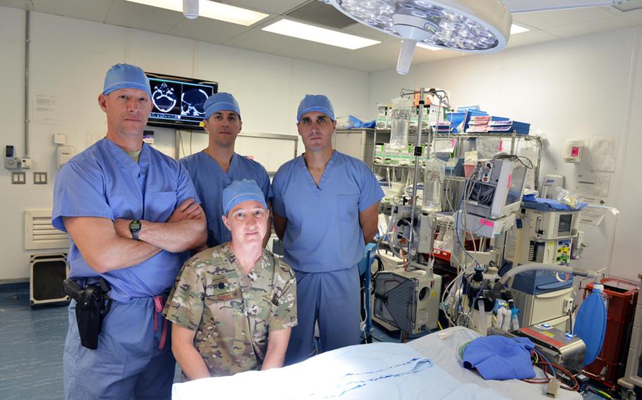 Surgeons of the U.S. Air Force’s 455th Expeditionary Medical Group at Bagram Air Field are pictured here in the operating room at Craig Joint Theater Hospital on Friday, June 10, 2016. Back row, from left to right are Lt. Col. Chance Henderson, Maj. Phillip Parry and Lt. Col. Stephen Maturo. In front is Lt. Col. Jamie Rand, the hospital’s “Trauma Czarina.”