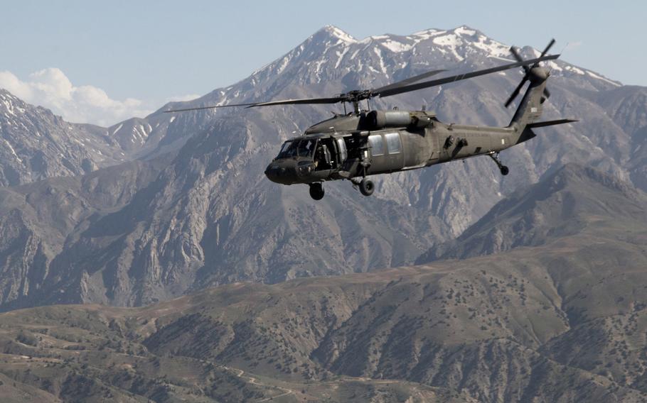 A California Army National Guard UH-60 Black Hawk helicopter transports troops in Afghanistan, May 20, 2016.At a summit in Warsaw, Poland, this week, NATO is set to commit to continue its support of government forces in Afghanistan.