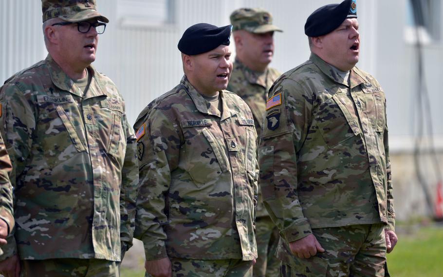 Soldiers sing the Army Song at the conclusion of the U.S. Army Garrison Rheinland-Pfalz change-of-command ceremony in Kaiserslautern, Germany, Wednesday, July 6, 2016. Col. Keith Igyarto took command from Col. G. Shawn Wells Jr. at the ceremony.