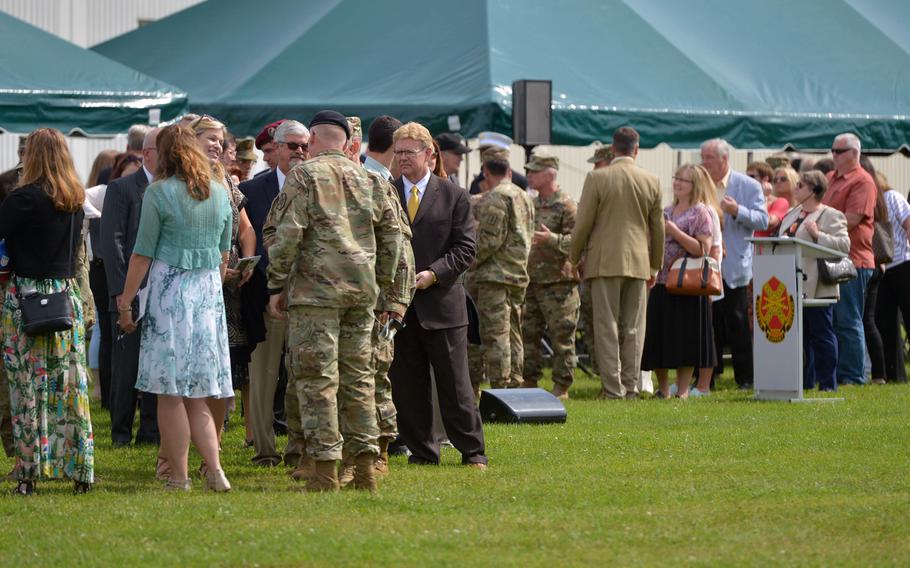 Guests at the U.S. Army Garrison Rheinland-Pfalz's change-of-command ceremony in Kaiserslautern, Germany, line up to say goodbye to the outgoing commander Col. G. Shawn Wells Jr. Col. Keith Igyarto took command from Wells at the ceremony, Wednesday, July 6, 2016.