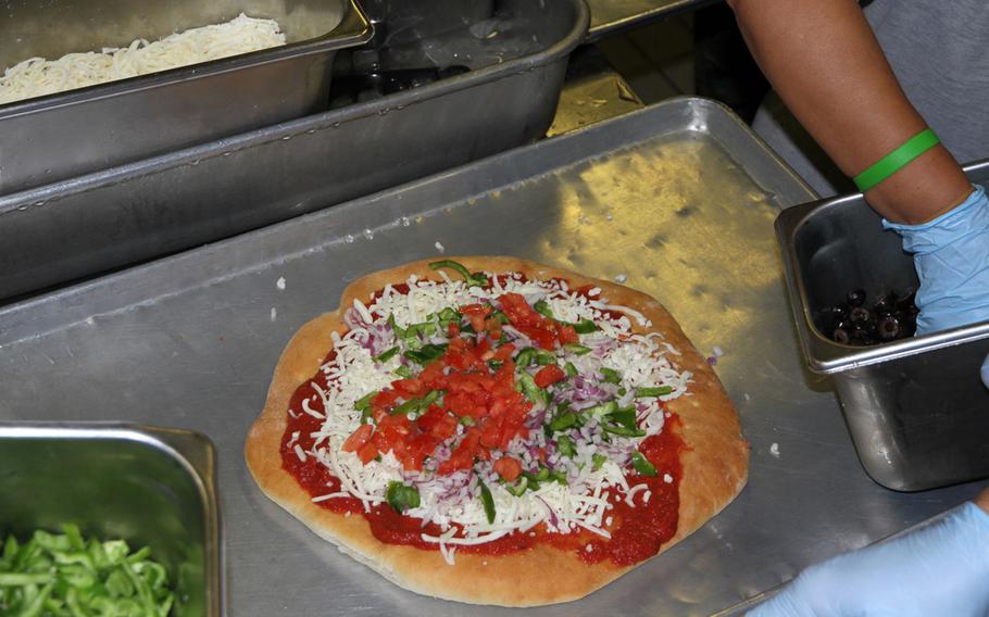 One of many pizzas made on Thursday, July 7, 2016, at 12th Marines Mess Hall on Camp Hansen during an exchange with residents from the Reimei No Sato home for disabled adults.