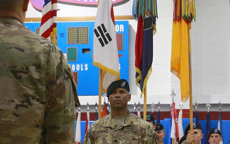 The Fort Hood, Texas-based 2nd Battalion, 8th Cavalry Regiment participates in a casing of the colors ceremony at Camp Red Cloud, Friday, July 8, 2016. It is the first major unit to leave the mountainous area near the front lines with North Korea.