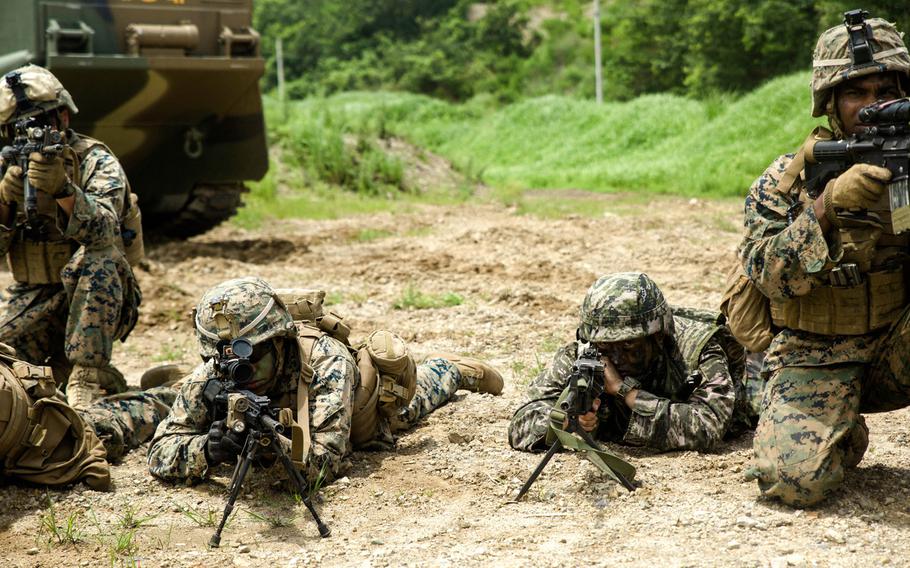 U.S. and Republic of Korea Marines sight in side-by-side in front of ROK Assault Amphibious Vehicles July 6, 2016 at Suseong Range, South Korea, during a Korean Marine Exchange Program. The goal of the KMEP is to sustain the combined force and enhance the ROK-U.S. team at the tactical level to build combined warfighting capabilities. During this exercise the Marines carried out a bilateral regimental-sized Marine Air Ground Task Force operation for the first time. The ROK Marines were a part of 73rd Battalion, 7th Regiment, 1st Marine Division. The U.S. service members are a part of 2nd platoon, Fox Company, 2nd Battalion, 2nd Marine Regiment, currently attached to 4th Marine Regiment, III Marine Expeditionary Force through the unit deployment program.