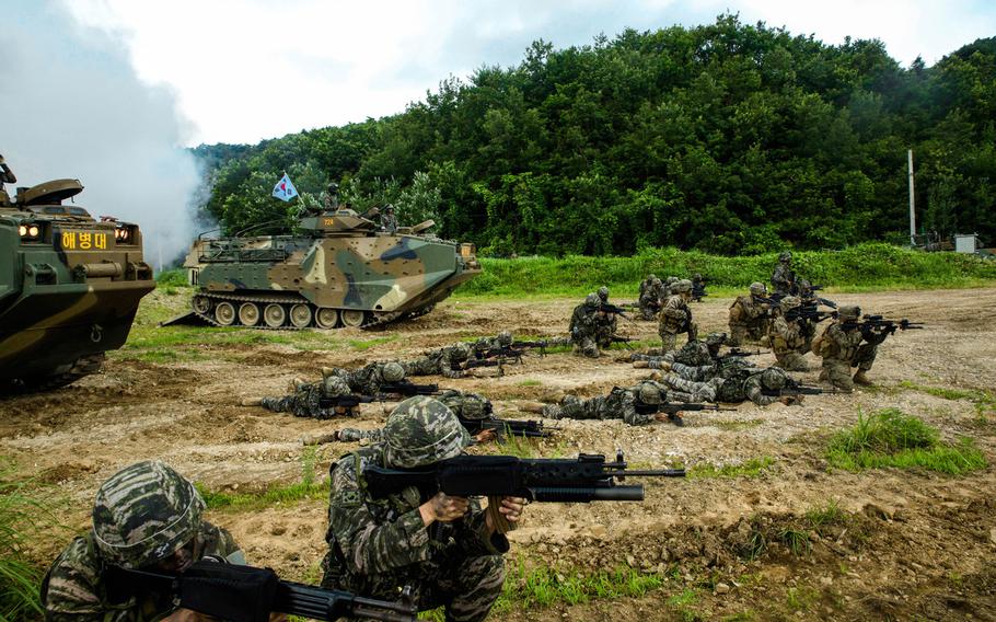 U.S. and Republic of Korea Marines sight in side-by-side in front of ROK Assault Amphibious Vehicles July 6, 2016 at Suseong Range, South Korea, during a Korean Marine Exchange Program. The goal of the KMEP is to sustain the combined force and enhance the ROK-U.S. team at the tactical level to build combined warfighting capabilities. During this exercise the Marines carried out a bilateral regimental-sized Marine Air Ground Task Force operation for the first time. The ROK Marines were a part of 73rd Battalion, 7th Regiment, 1st Marine Division. The U.S. service members are a part of 2nd platoon, Fox Company, 2nd Battalion, 2nd Marine Regiment, currently attached to 4th Marine Regiment, III Marine Expeditionary Force through the unit deployment program.
