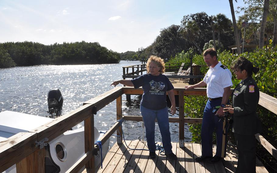 Kelly Kowall gives a tour of her servicemember retreat My Warrior's Place in Ruskin Florida on March 9 to retired Lt. Col. Rob Proctor and Capt. Sara Fernandez from Lennard High School Jr. ROTC, which were planning a volunteer day.