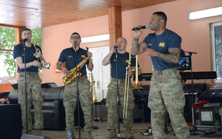 From left, Spc. Aaron Johnson, Spc. Michael Zuniga, Spc. Nick McDermott and Sgt. 1st Class Walter Washington of the Army's 10th Mountain Division Band perform at a belated U.S. Independence Day celebration on Friday, July 8, 2016, at Resolute Support headquarters in Kabul, Afghanistan.