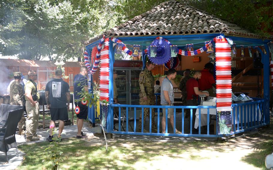 Gazebo decorated in red, white and blue for Resolute Support's U.S. Independence Day celebration on Friday, July 8, 2016.