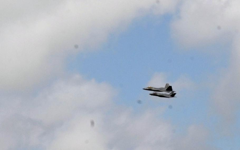 An F-22A Raptor and F-35A Lighting II flu in formation during the Royal International Air Tattoo at RAF Fairford, England, Friday, July 8, 2016. Gen. Frank Gorenc, commander of US Air Forces Europe, said all the lessons learned with the F-22 are incorporated as improvements in the F-35.