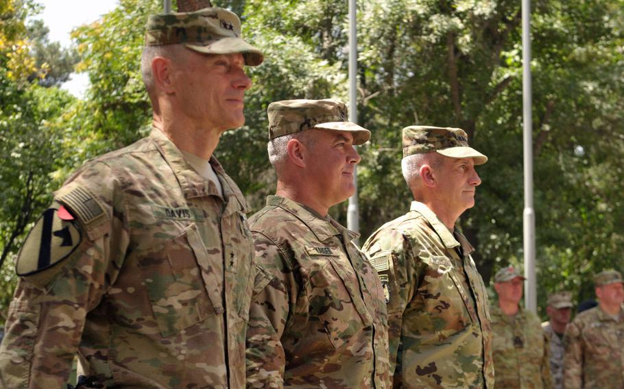 Maj. Gen. Gordon B. Davis Jr., left, Maj. Gen. Richard Kaiser, center, and Gen. John Nicholson, right, attend the CSTC-A change-of-command ceremony July 14, 2016 at NATO's Resolute Support headquarters in Kabul, Afghanistan.