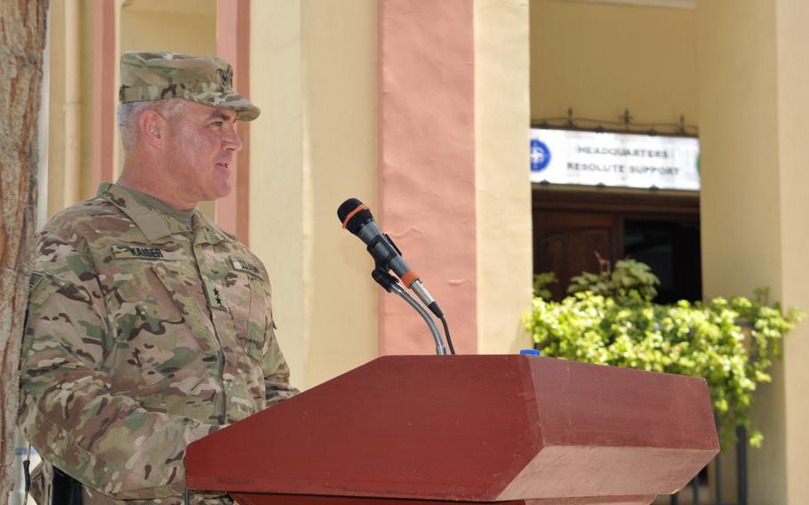 Maj. Gen. Richard Kaiser speaks to the assembled crowd after assuming command of Combined Security Transition Command - Afghanistan on Thursday, July 14, 2016, at NATO's Resolute Support headquarters in Kabul, Afghanistan.