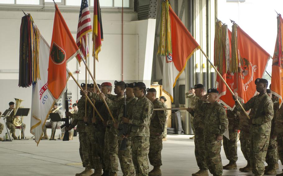 Members of the 5th Signal Command color guard stand in formation during a change-of-command ceremony on July 15, 2016, at Clay Kaserne in Wiesbaden, Germany. Col. Jimmy L. Hall handed over responsibility to Col. Rob Parker during the ceremony.