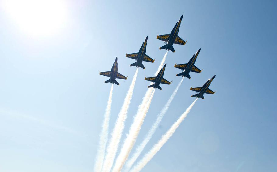 The Blue Angels fly in formation over the U.S. Naval Academy on graduation day in May. The elite flying demonstration squadron announced new officers, including three F/A-18 pilots, for the 2017 air show season.