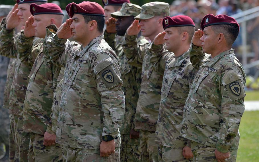 Soldiers with U.S. Africa Command salute during the change-of-command ceremony in Stuttgart, Germany, on Monday, July 18, 2016. Marine Gen. Thomas D. Waldhauser took command of AFRICOM from Army Gen. David M. Rodriguez at the ceremony.