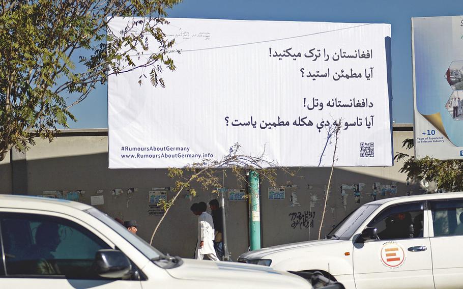 A billboard placed by the German Embassy in Kabul, Afghanistan on Nov. 15, 2015, asks Afghans to think twice before trying to migrate to Europe. Waves of Afghans have fled to Europe trying to flee violence and economic problems.