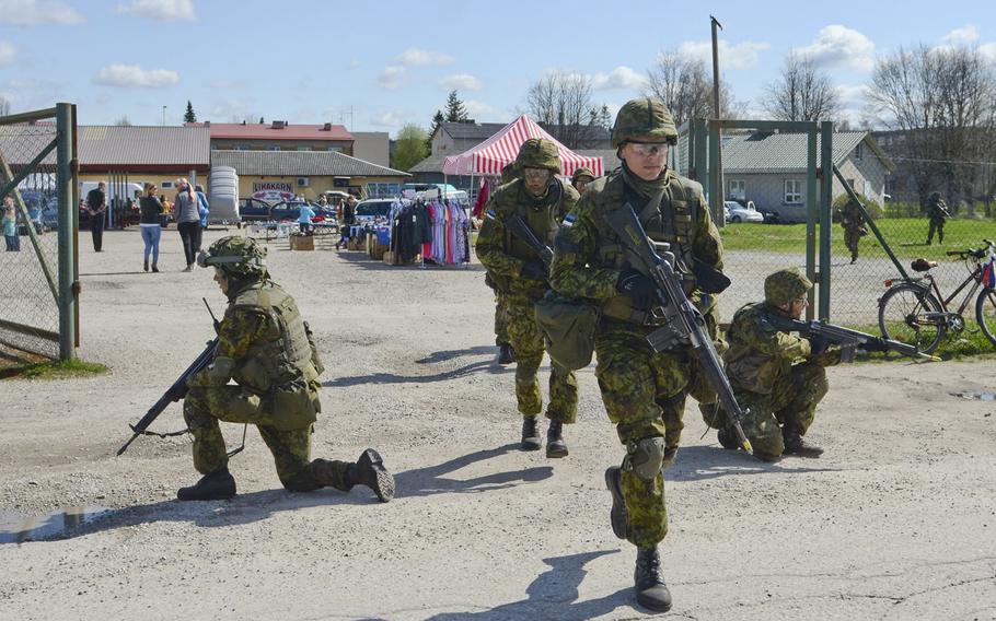 Estonian Soldiers of 2nd Infantry Brigade, Kuperjanov Battalion, move through an open market in the center of town during an urban operations exercise, Voru, Estonia, April 30,2016. Republican presidential nominee Donald Trump has criticized the European allies for not contributing enough financially to the alliance. Steven M. Colvin/U.S. Army