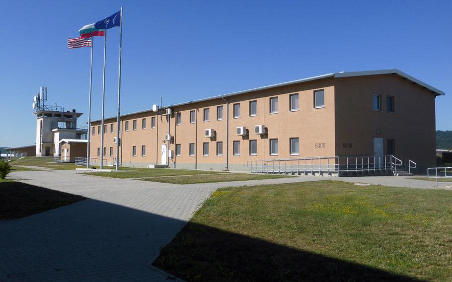 American, Bulgarian and NATO flags fly over the U.S. headquarters building at the Novo Selo Training Area, Bulgaria, in June 2015. The Army's Installation Management Command-Europe is taking over U.S. base operations at training sites in Bulgaria and Romania, adding about 49 jobs.