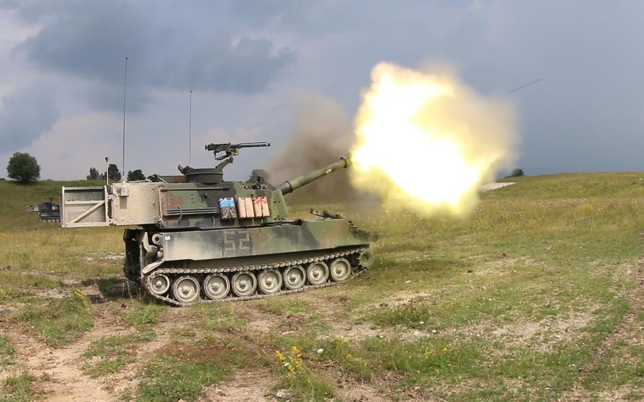 An M109A6 Paladin belonging to Alpha Battery, 1st Battalion, 41st Field Artillery Regiment fires during a live-fire exercise at the training grounds in Vilseck, Germany, on Tuesday, July 26, 2016.