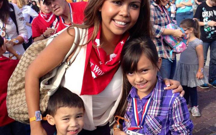 Debbie Venetz, center with her two children Jace, left and Alexa, who are now 8 and 12. The children were just small when their father Sgt. 1st Class Anthony Venetz died in Afghanistan in January 2011.