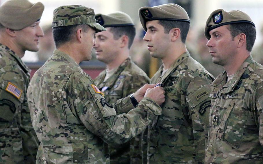 Gen. Daniel B. Allyn, vice chief of staff of the U.S. Army, presents the Silver Star to Sgt. Derek J. Anderson on April 29, 2015, at Hunter Army Airfield, Savannah, Ga. on Dec. 2, 2014, in Nangarhar province, Afghanistan. Anderson, Staff Sgt. James Jones and Sgt. Travis Dunn directly contributed to the elimination of 25 enemy fighters. 