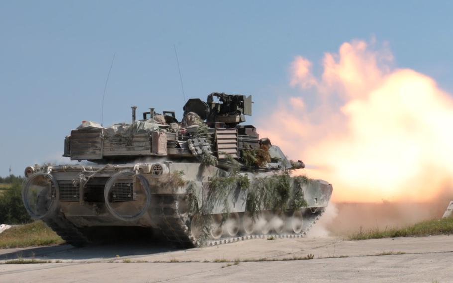 A 2nd Battalion, 7th Infantry Regiment tank fires downrange at the U.S. Army training grounds in Grafenwoehr, Germany, on Aug. 18, 2016. The tanks were participating in a combined live-fire exercise as part of the Combined Resolve VII multinational training event that is scheduled to wrap up Sept. 15, 2016.