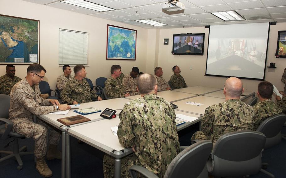 U.S. Naval Forces Central Command members at Naval Support Activity in Bahrain attend a teleconference ceremony for the 2015 Admiral Stanley R. Arthur Awards. The annual Admiral Stanley R. Arthur Award for Logistics Excellence was established in 1997 for both both individuals and teams.