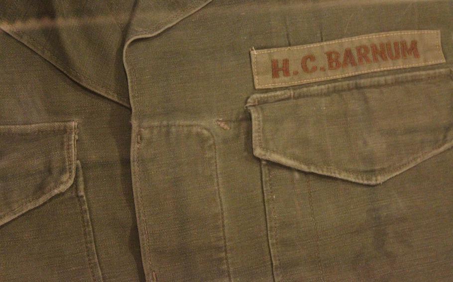A 3rd Marine Division display inside its headquarters at Camp Courtney, Okinawa, includes the uniform of Marine 1st Lt. Harvey C. Barnum Jr., who was awarded the Medal of Honor for actions in Quang Tin Province, Vietnam, in 1965. Barnum assumed command of a rifle company in the midst of a deadly ambush and led a successful counterattack.