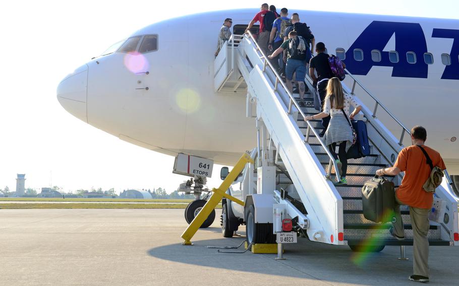 Travelers board the Patriot Express rotator at Aviano Air Base, Italy, on Sept. 28, 2016. Beginning Oct. 1, 2016, the Patriot Express rotator mission will no longer be available into and out of Aviano Air Base.