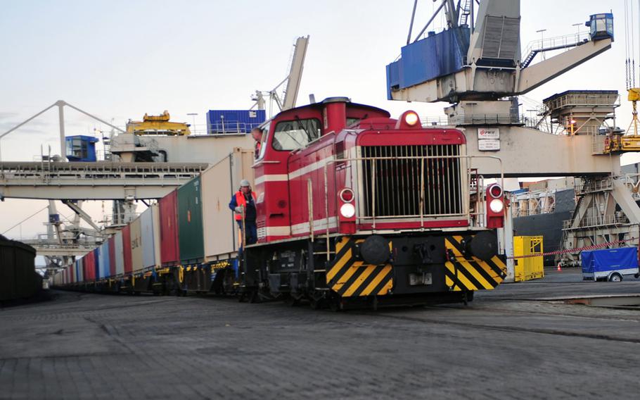 A train pulling cars of Army and Air Force ammunition moves out of the port Saturday, Oct. 29, 2016, at Nordenham, Germany, for movement to the Miesau Army Depot. More than 600 containers of ammunition -- the largest Army-run ammunition shipment to Europe in more than 20 years -- arrived at the port and were shipped to the depot for storage.