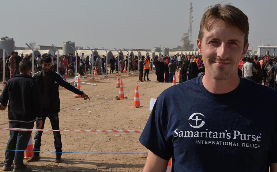Caleb Drown, pictured here at the Khazir displacement camp at Hassan Sham, Iraq, on Monday, Nov. 7, 2016, went from serving as a Marine to relief and development work after noticing a gap between the U.S. military and the populations it seeks to protect.