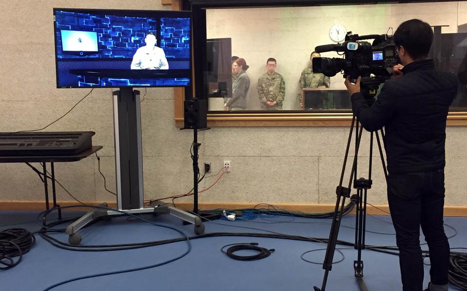A cameraman shoots video at the new headquarters for American Forces Network Pacific Korea at Camp Humphreys, South Korea, Tuesday, Nov. 15, 2016. AFN will provide high-definition television for all channels by the end of next year, a senior official told Stars and Stripes.