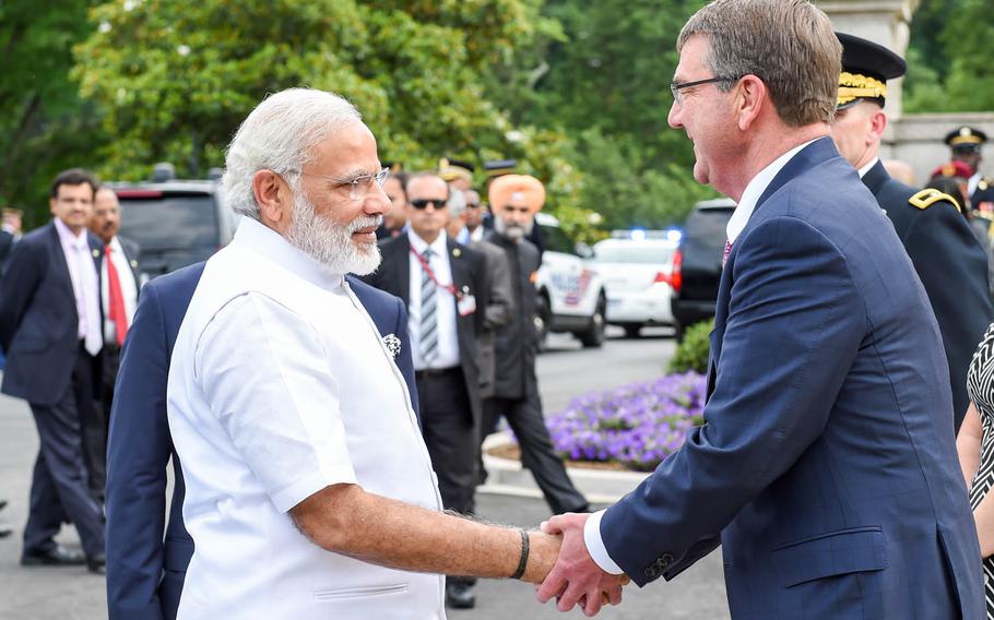 Secretary of Defense Ash Carter, right, greets India Prime Minister Narendra Modi at Arlington National Cemetery, Va., before a wreath-laying ceremony, June 6, 2016. The U.S. and India have been drawing closer for years, and the good vibes should continue under the new president, said Robert M. Hathaway, a public policy fellow associated with the Asia Program at the Woodrow Wilson International Center for Scholars.